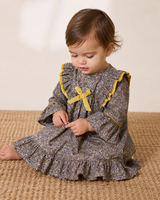 Vestido estampado con detalles amarillos