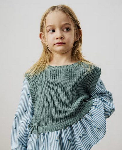 Blusa con chaleco integrado