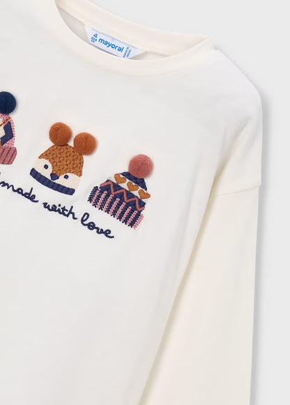 Blusa blanca manga larga detalle bordado 3D